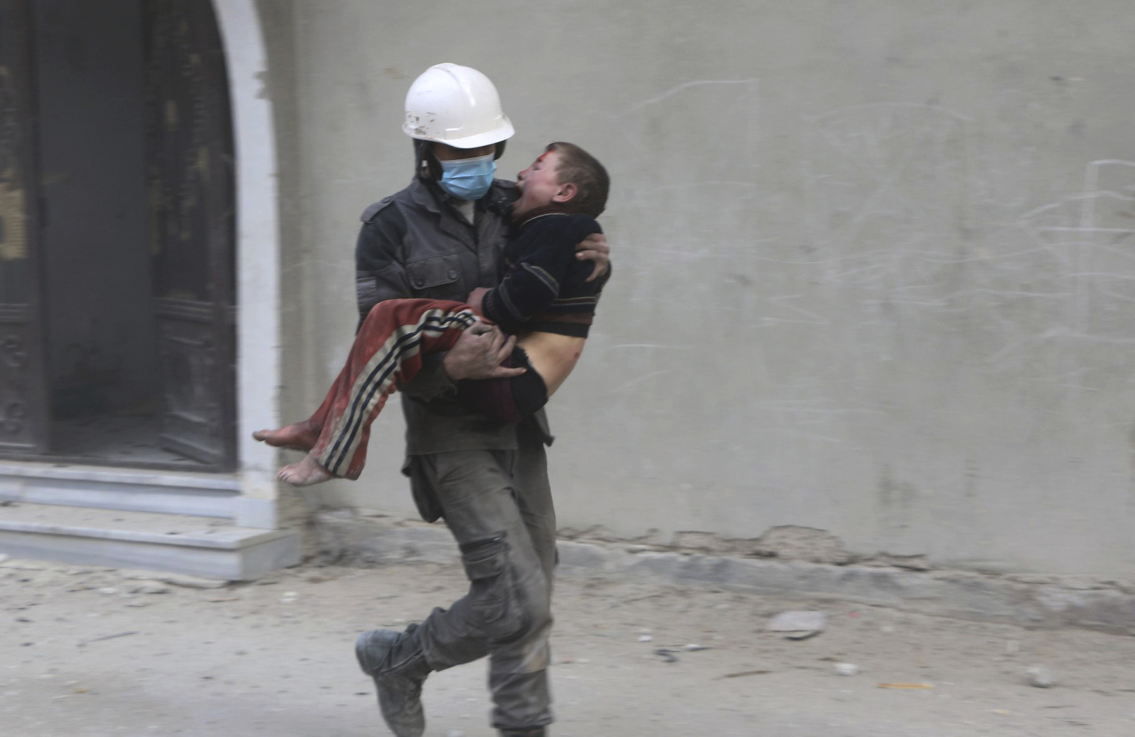 (Syrian Civil Defense White Helmets via AP)