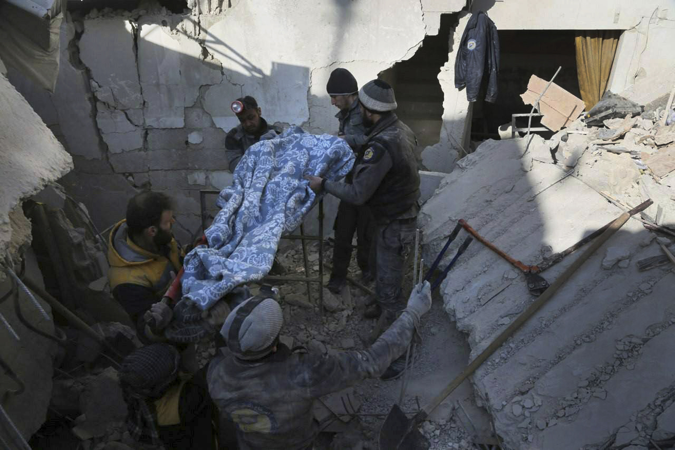 (Syrian Civil Defense White Helmets via AP)