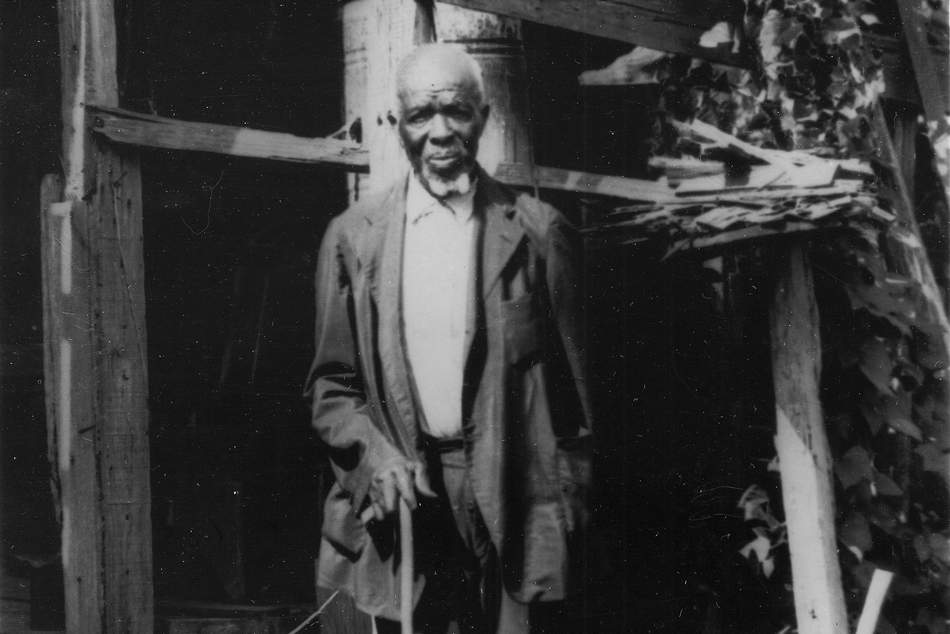 Cudjo Lewis was born in West Africa, abducted and sold as a slave in Alabama six years before the Civil War ended. He was 86 when Zora Neale Hurston interviewed him, as recounted in her newly published book "Barracoon." [Courtesy of McGill Studio Collection, The Doy Leale McCall Rare Book and Manuscript Library, University of South Alabama]