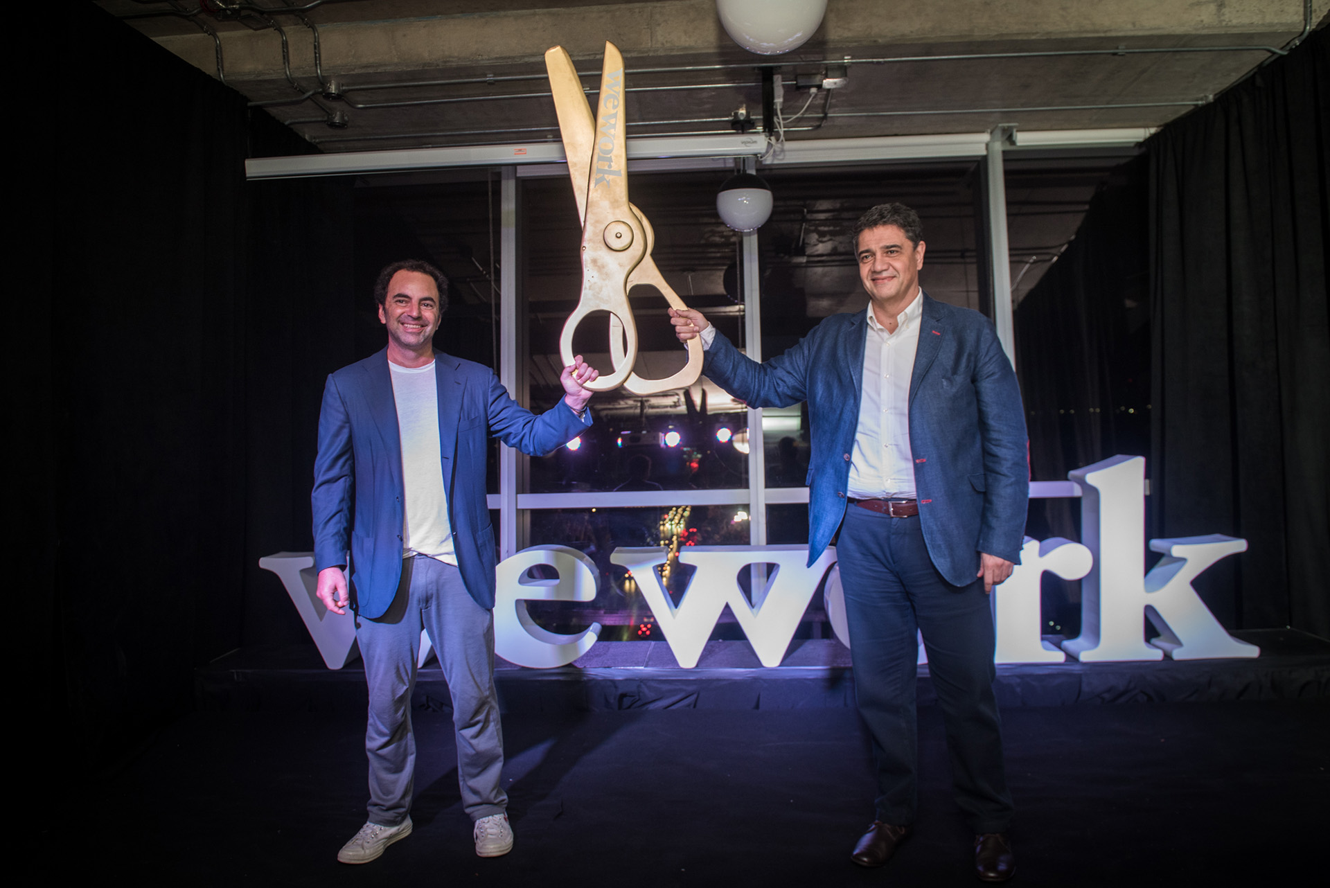 Patricio Fuks y Jorge Macri tras el corte de cinta del nuevo edificio de WeWork