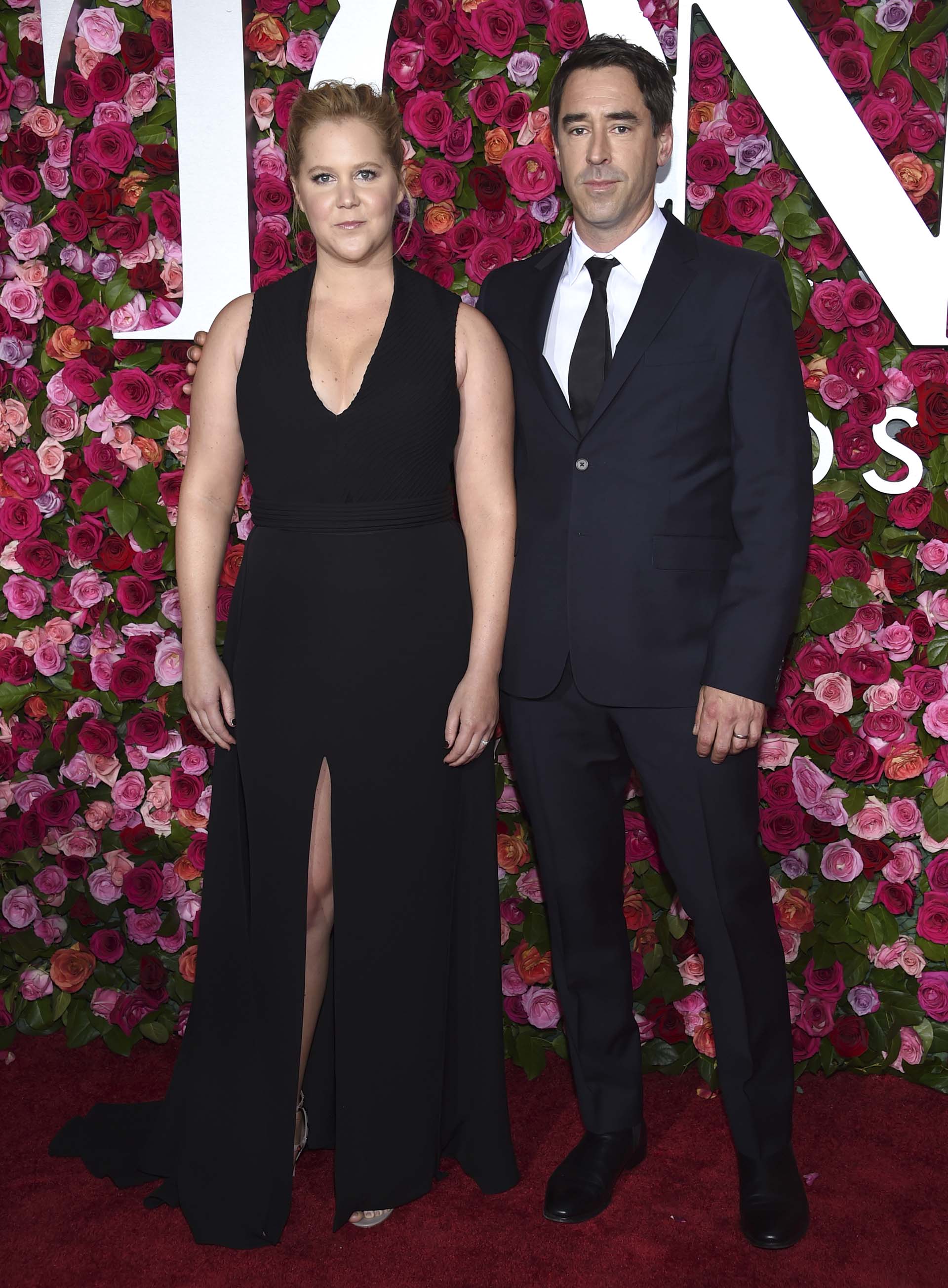 Amy Schumer y Chris Fischer (Evan Agostini/Invision/AP)