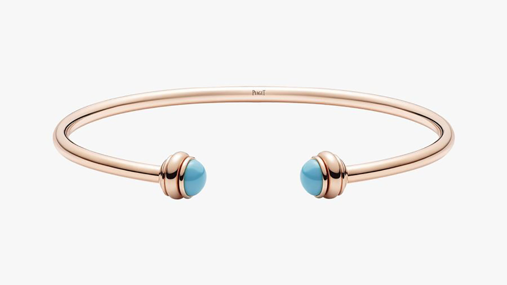 Desde 2.260 dólares, este brazalete está a la venta en diferentes colores. Una pieza también de la colección de Possession realizado en oro rosa de 18 quilates con dos cabujones en color turquesa (Piaget)