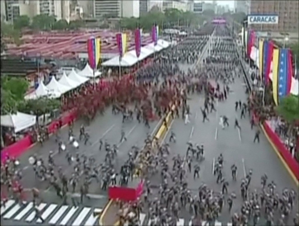 Venezuelan National Guard soldiers run during an event which was interrupted, in this still frame taken from video August 4, 2018, Caracas, Venezuela. VENEZUELAN GOVERNMENT TV/Handout via REUTERS TV. ATTENTION EDITORS - THIS IMAGE HAS BEEN PROVIDED BY A THIRD PARTY.