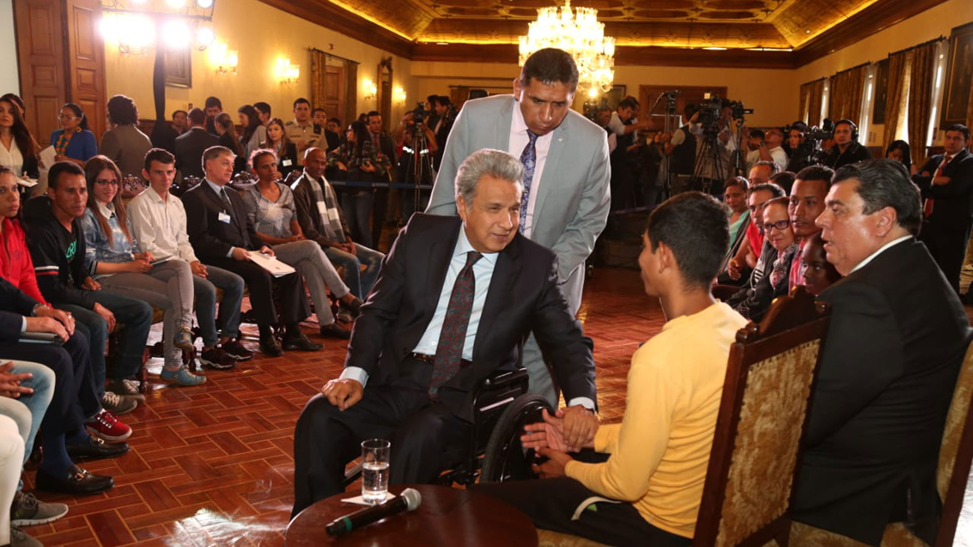 Lenín Moreno durante la reunión con los migrantes venezolanos