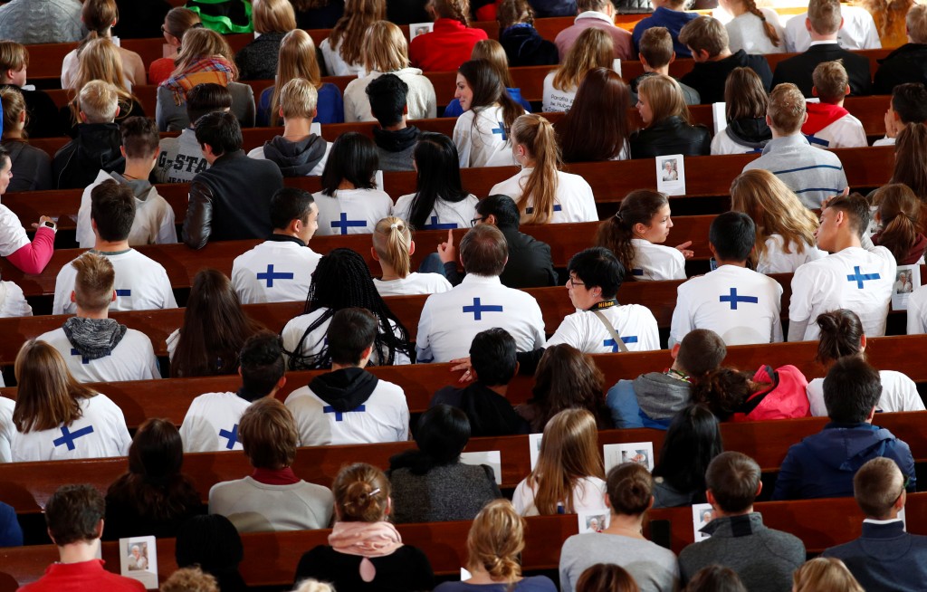 Estonian youth await the arrival of Pope Francis at an ecumenical meeting at Kaarli Lutheran Church in Tallinn, Estonia September 25, 2018. REUTERS/Max Rossi