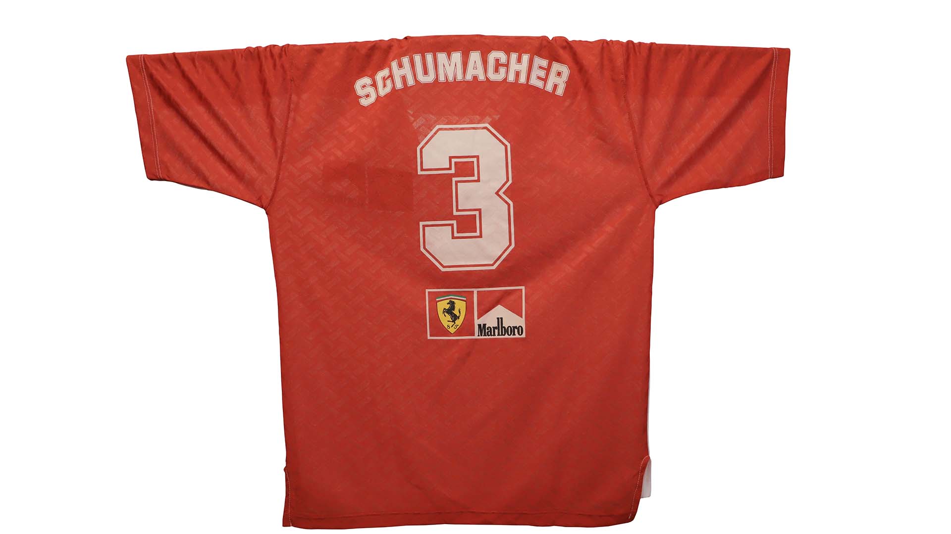 El número 3 con el que Schumacher corría, su nombre y el “Cavallino Rampante”, símbolo de la escudería Ferrari (Lihueel Althabe)