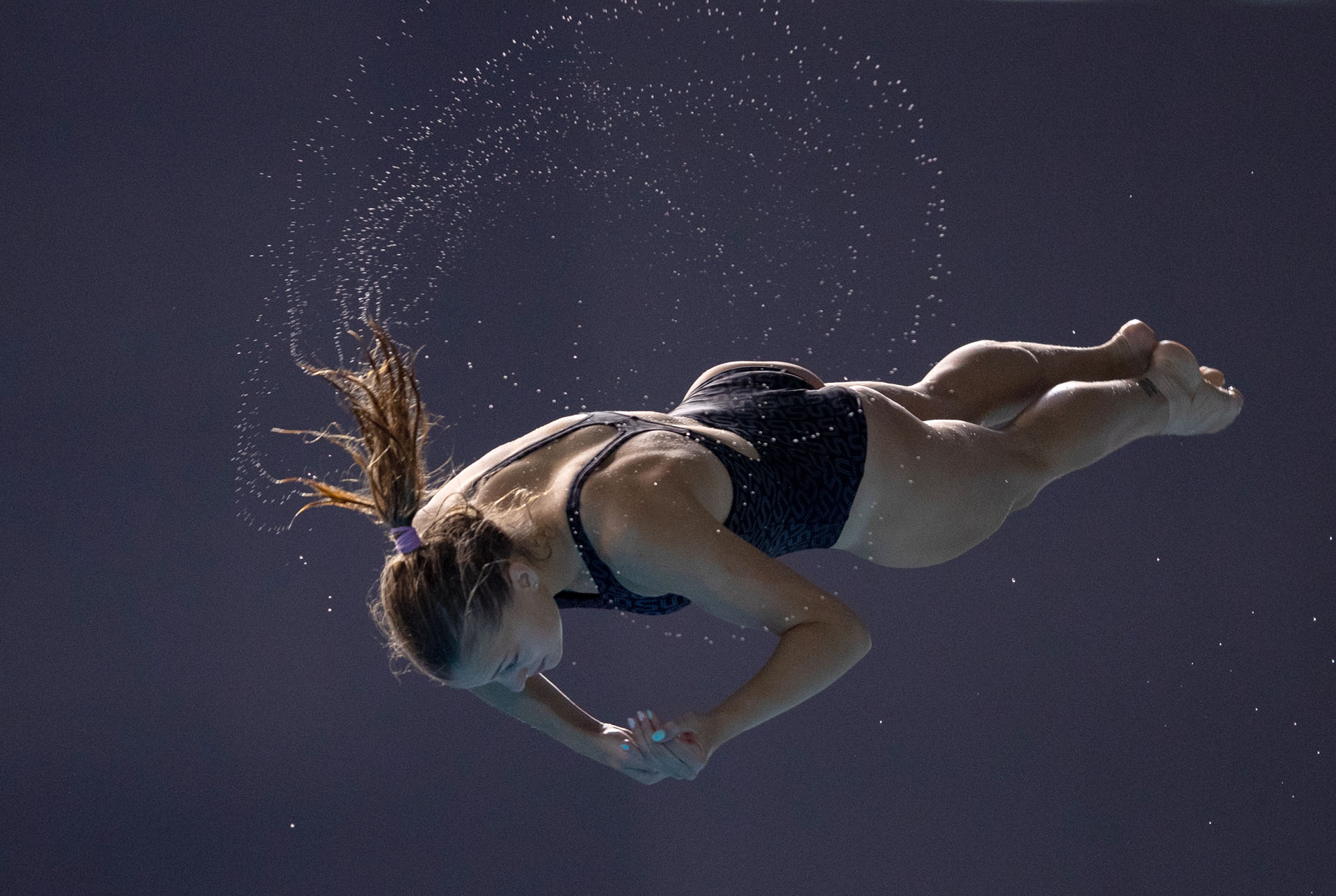 La ucraniana Sofiia Lyskun compitiendo en la preliminar de Trampolín para mujeres en el Natatorio Parque Olímpico de Buenos Aires (AFP)