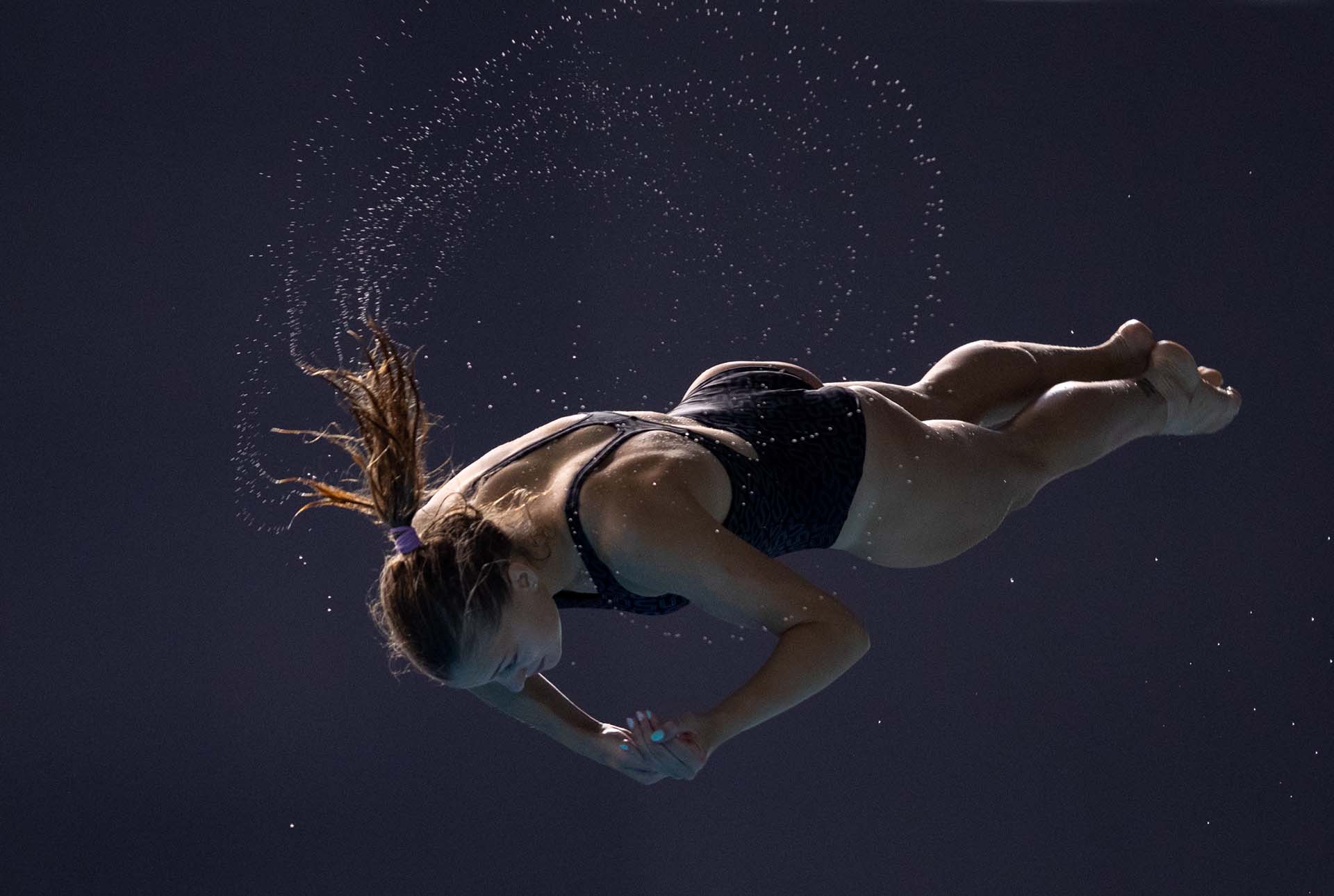 La ucraniana Sofia Lyskun competing salta desde los 3 metros al natatorio del parque olímpico (Foto: Gabriel HEUSI / OIS/IOC / AFP)