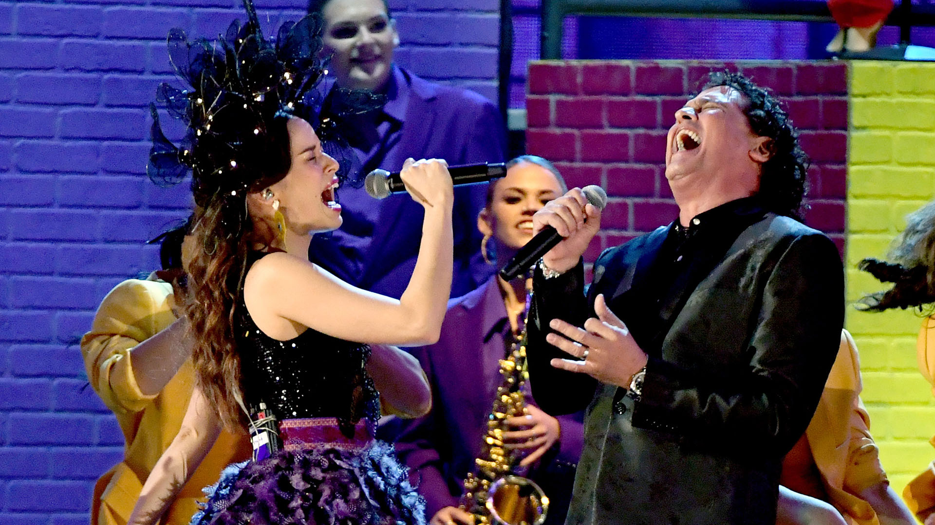 Catalina Garcia of Monsieur Perine y Carlos Vives en plena presentación