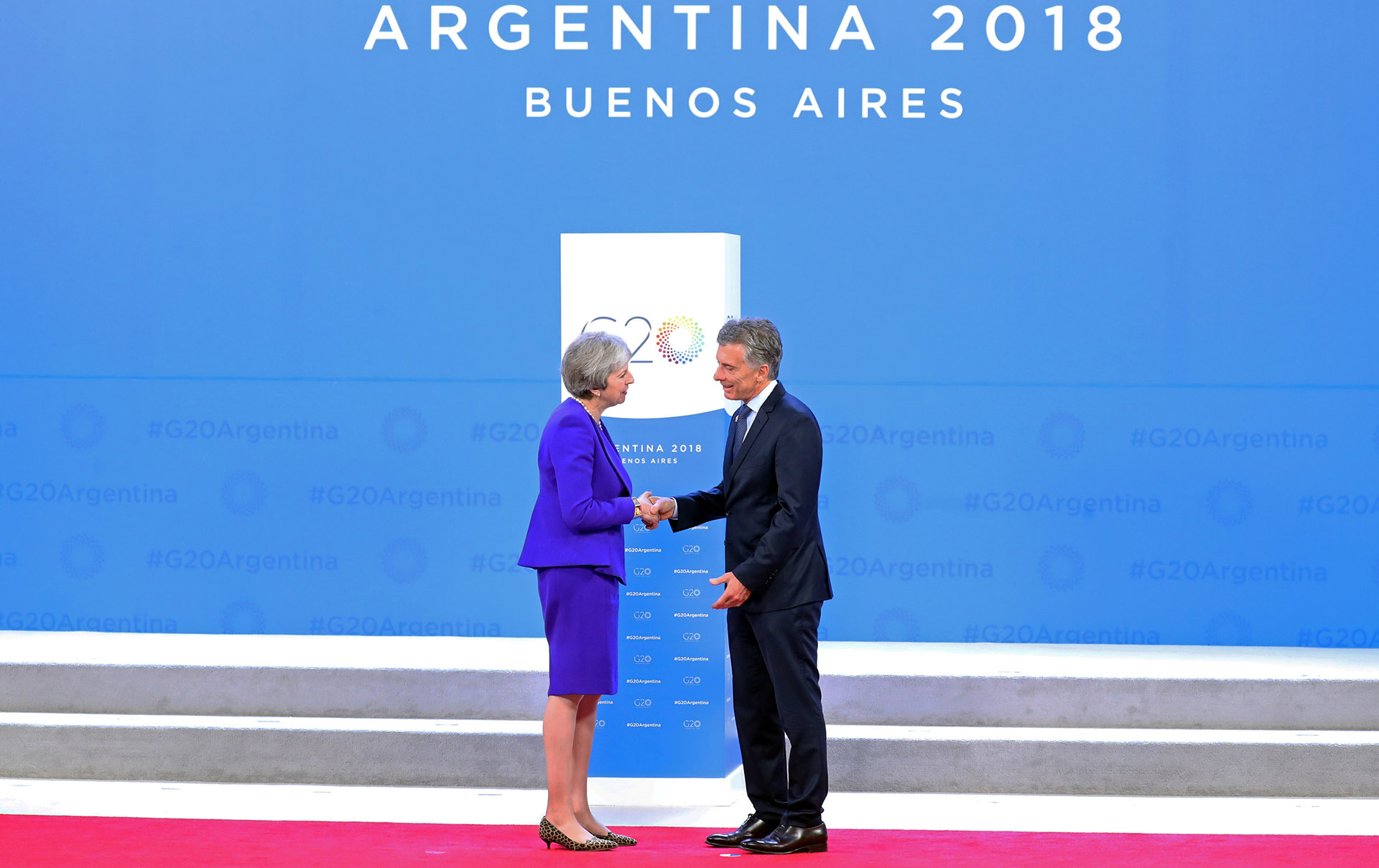 Theresa May y Macri