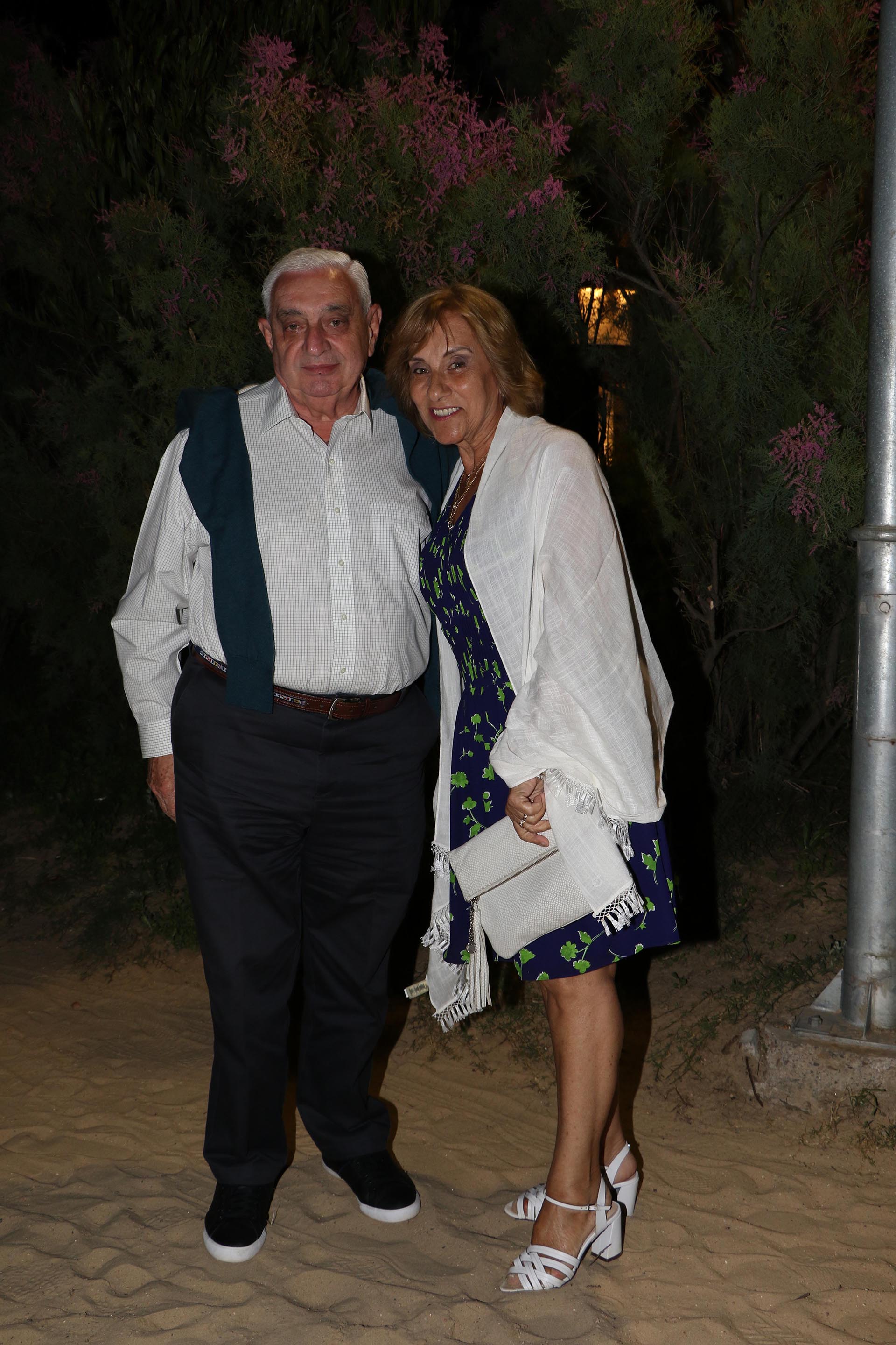 El presidente de la Bolsa de Comercio de Buenos Aires, Adelmo Gabbi, y su mujer