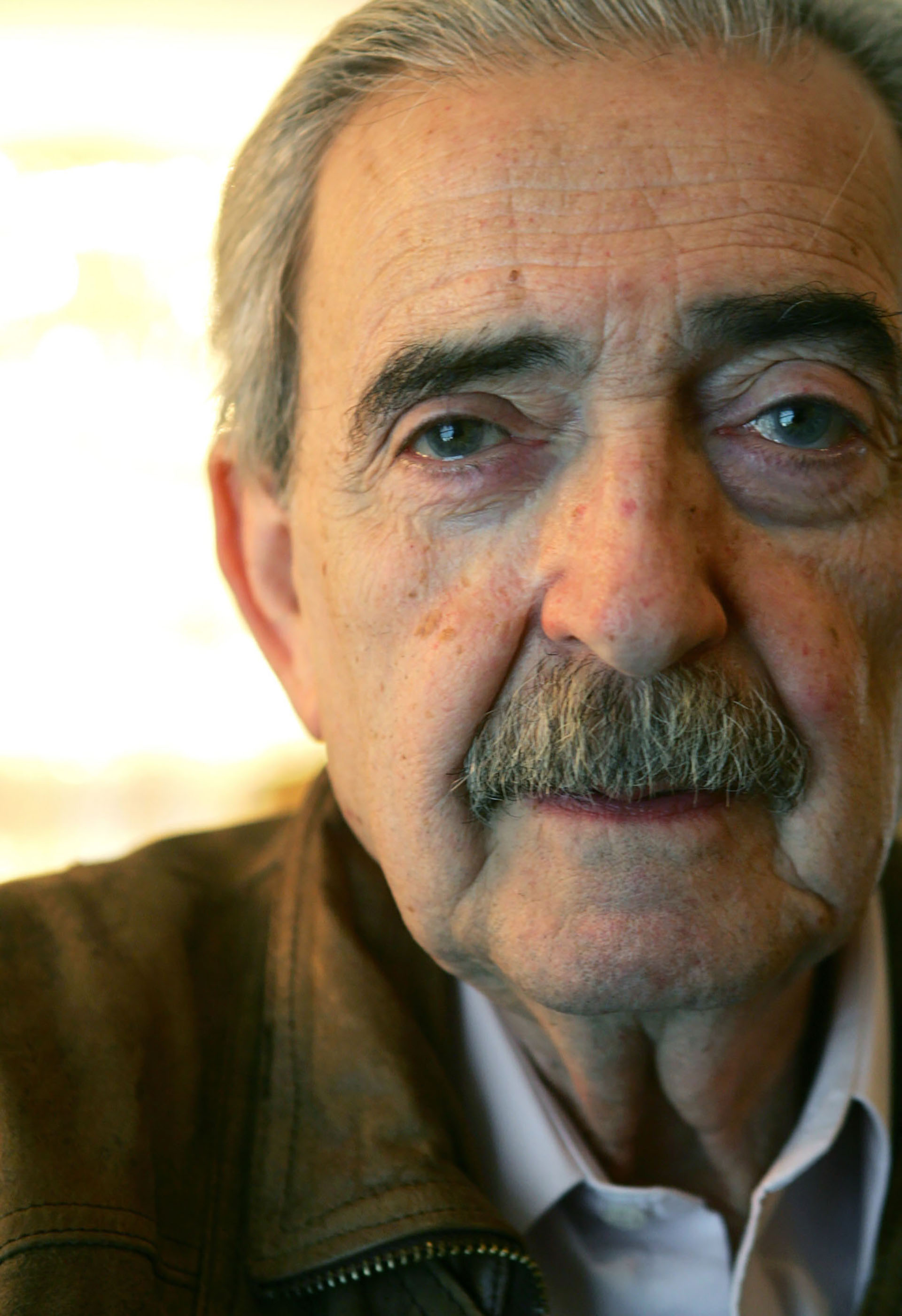 El poeta argentino Juan Gelman, ganador del premio Cervantes 2007, falleció a los 83años en Ciudad de México, donde se había instaladi hacía más de dos décadas (AFP)