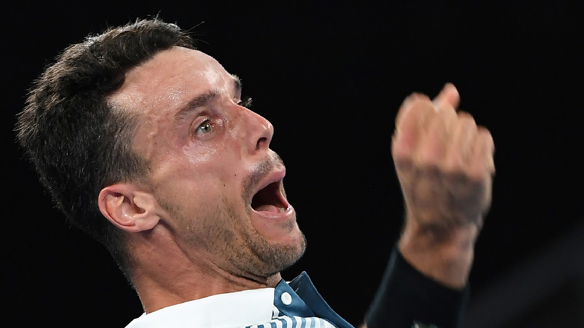 El español Roberto Bautista festeja su victoria ante John Millman por 6-3, 6-1, 3-6, 6-7 (6/8), 6-4
