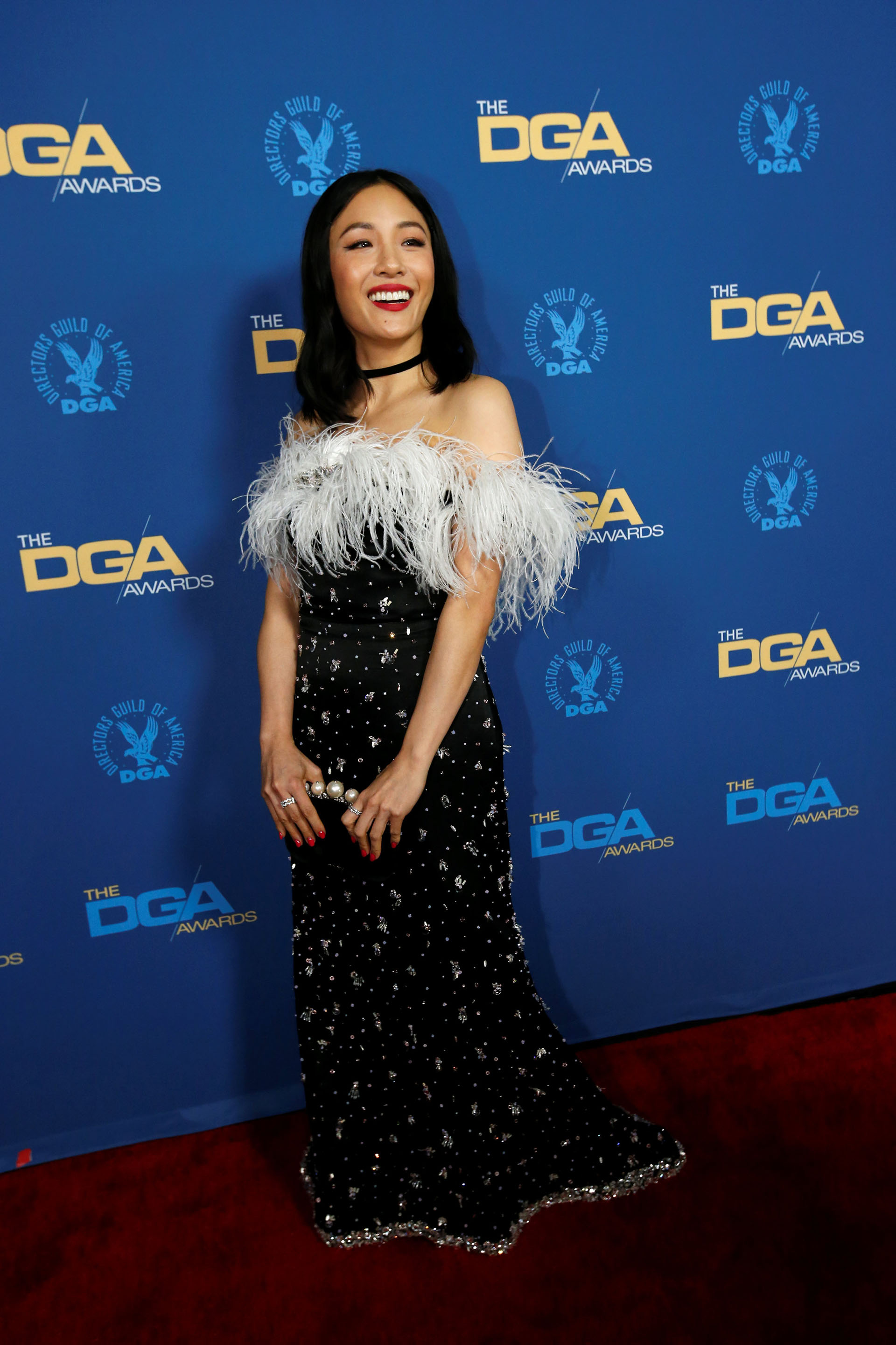 Plumas y brillos para Constance Wu
