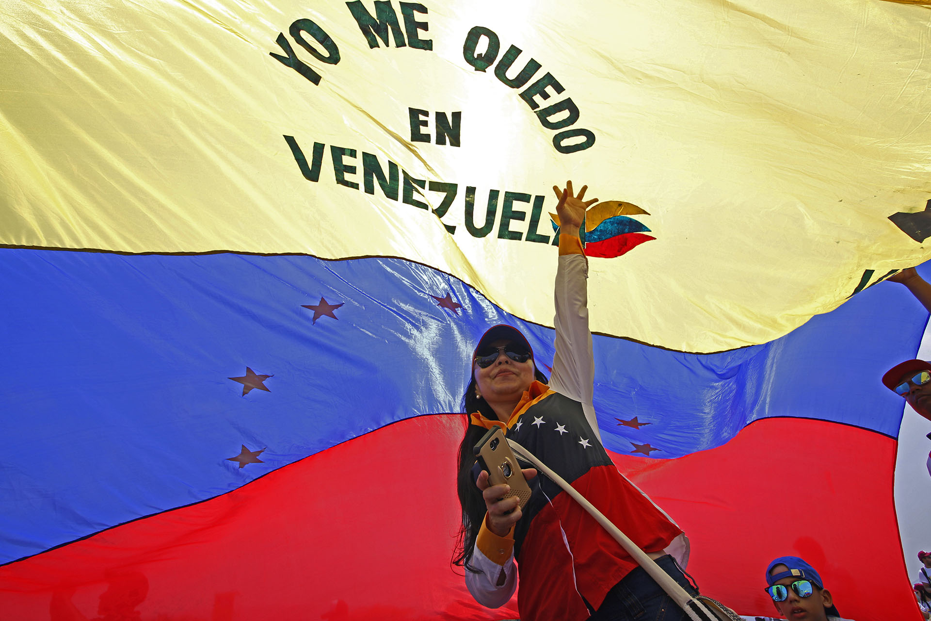“Yo me quedo en Venezuela” (AFP)