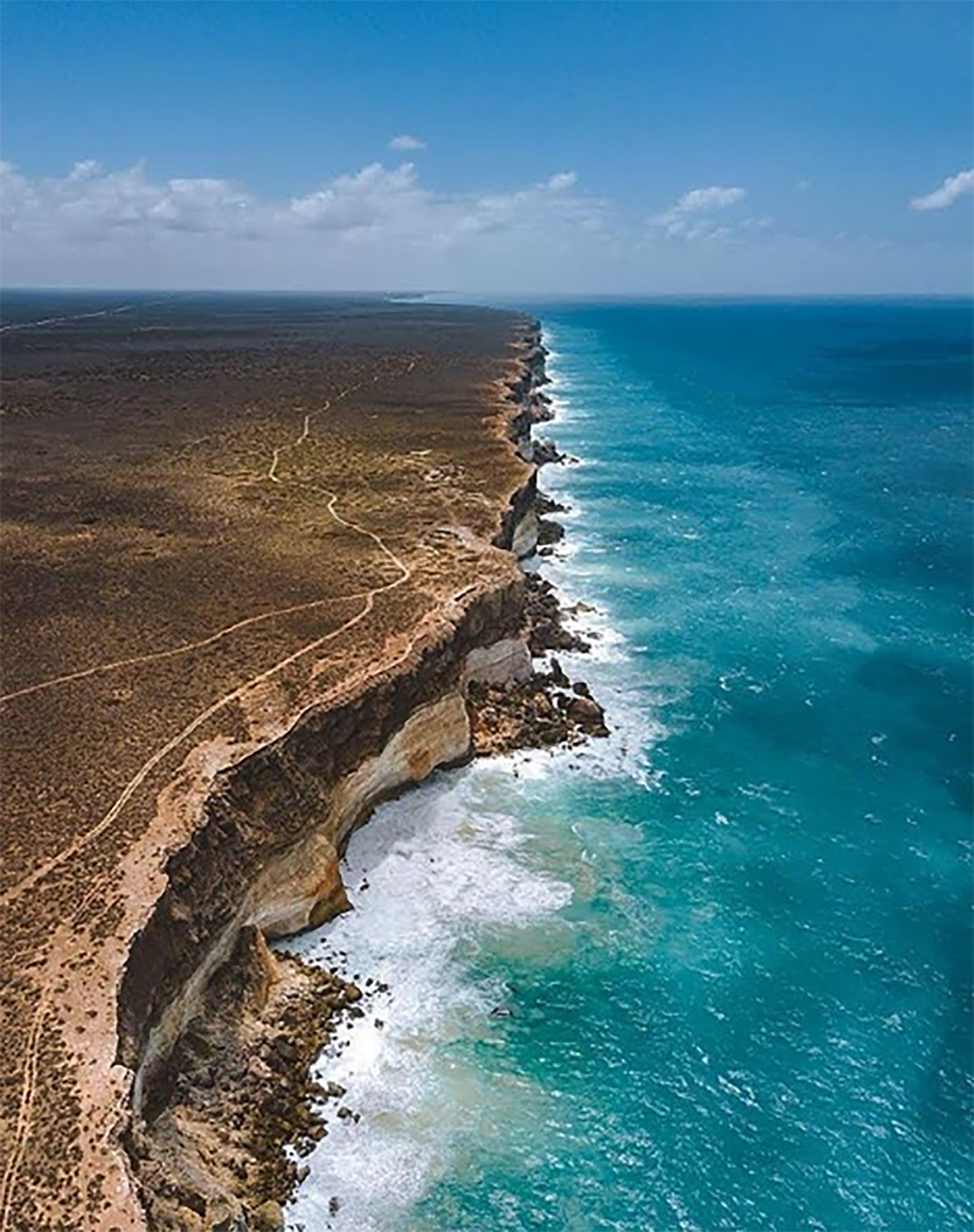 Sus aguas transparentes, sus arenas blancas y sus cielos celestes atraen a miles de turistas a diario (@Australia)