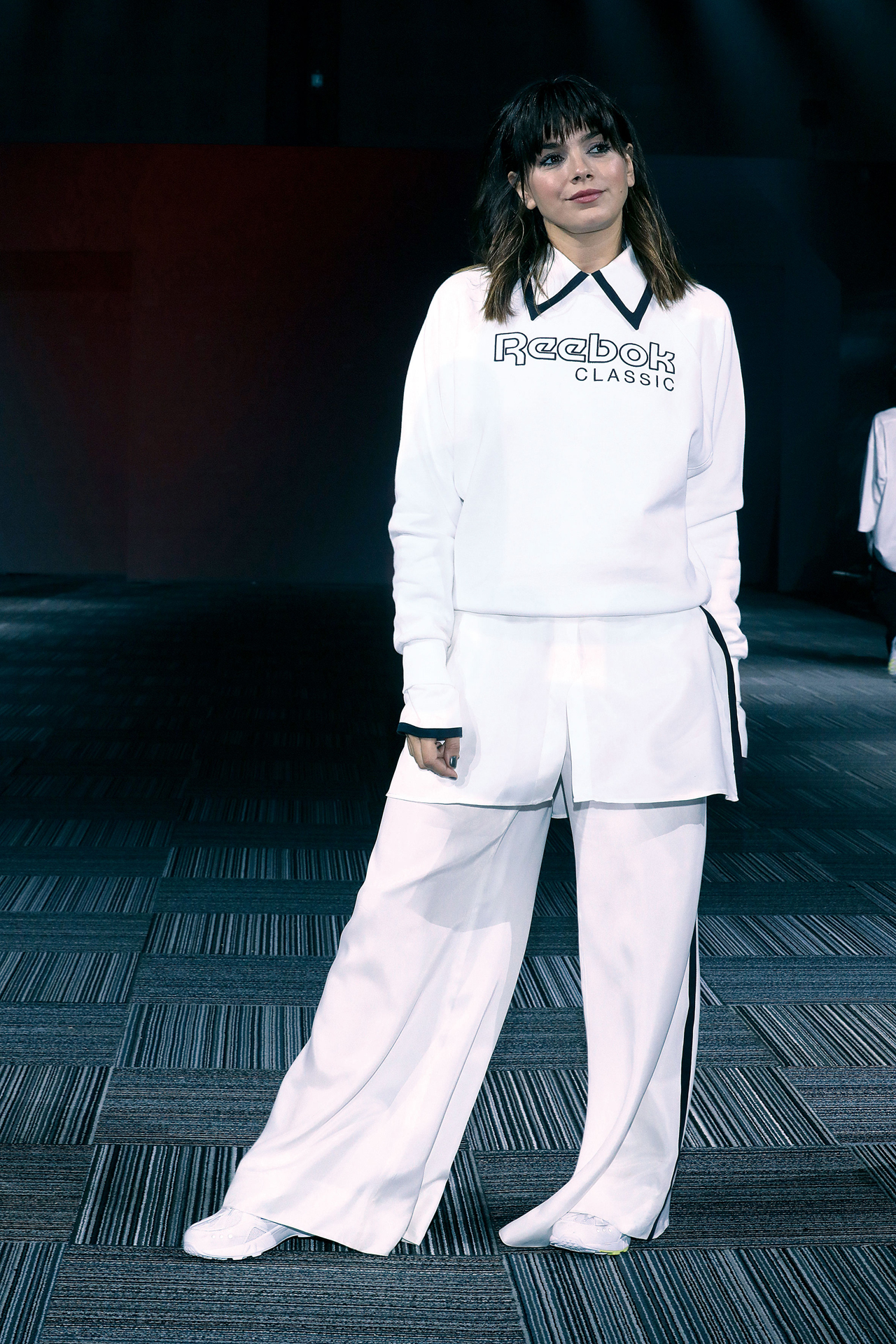 Natalie Pérez desfiló para Reebok: sporty chic y en blanco y negro.