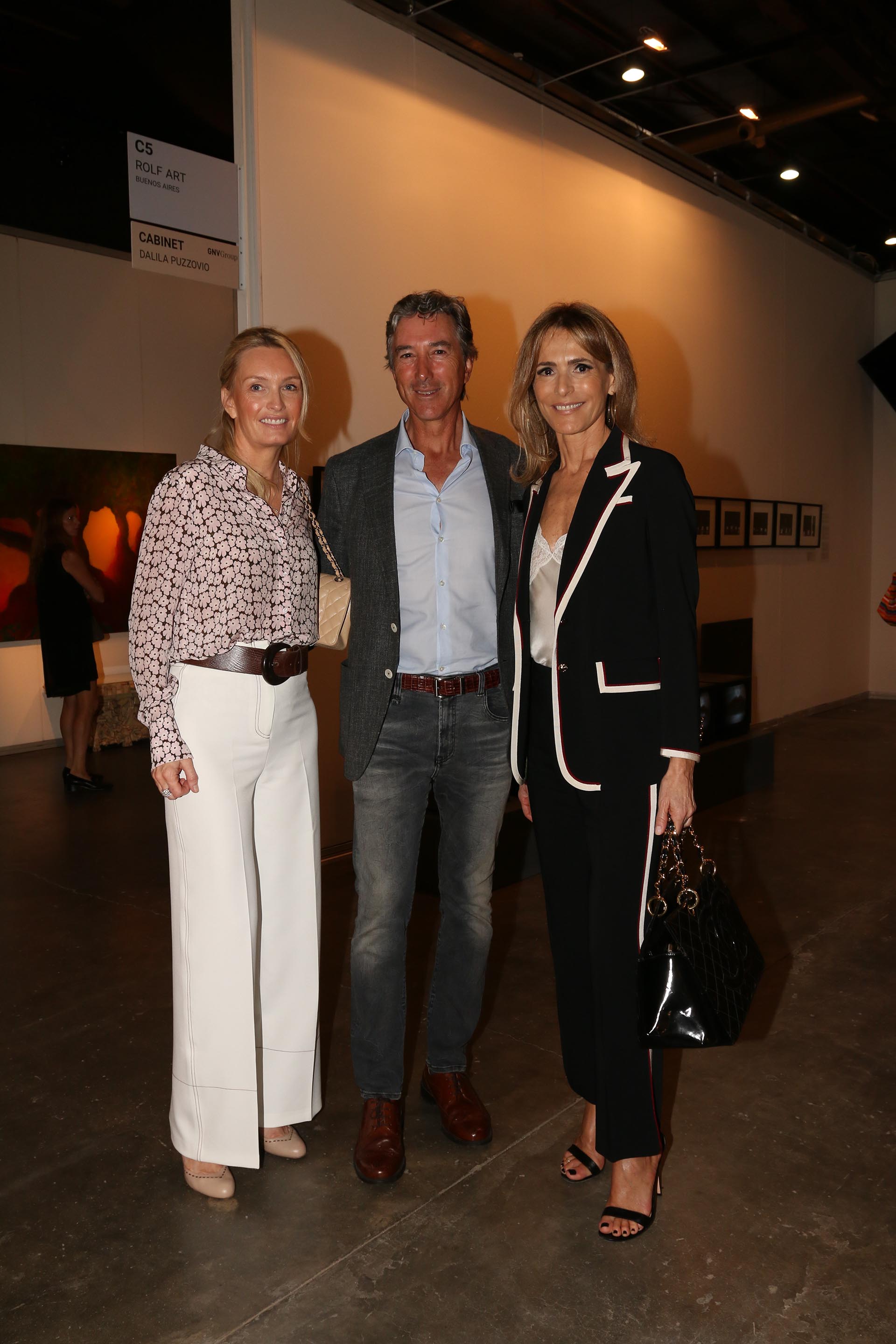 Cathrine y Pablo Roemmers junto a Rossella Della Giovampaola