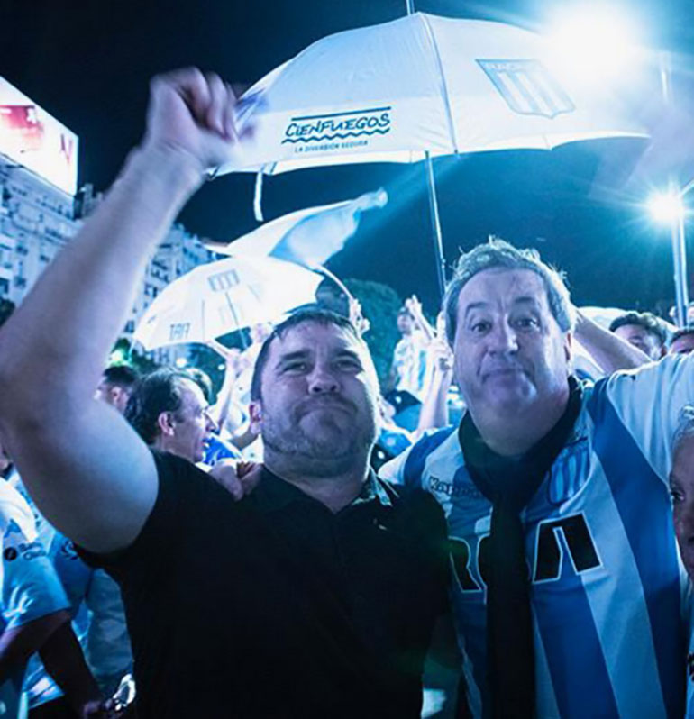 Coudet y Torres, unidos por la mítica bufanda del DT