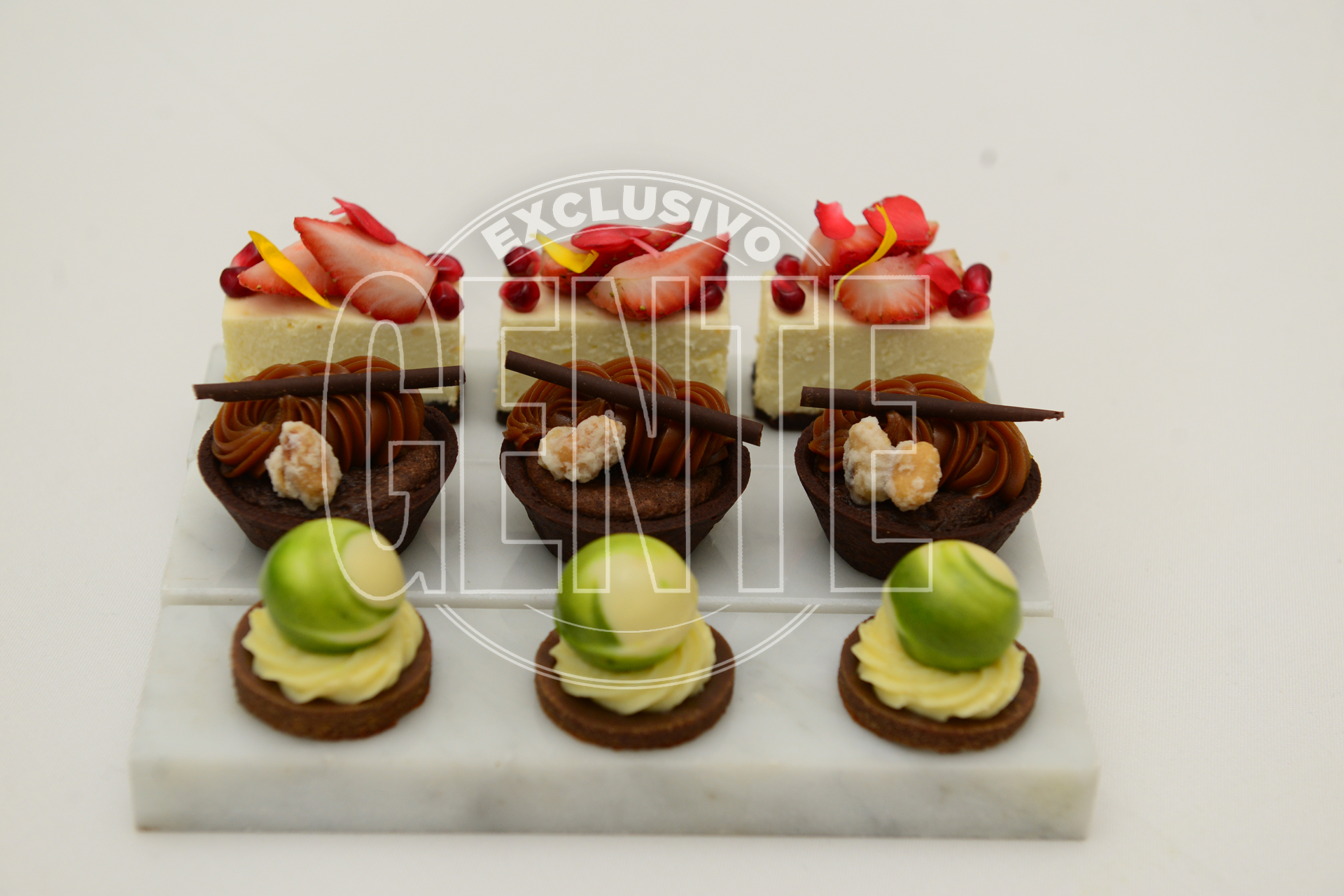 Cheese cake New York, souflee de dulce de leche y esferas de chocolate blanco.
