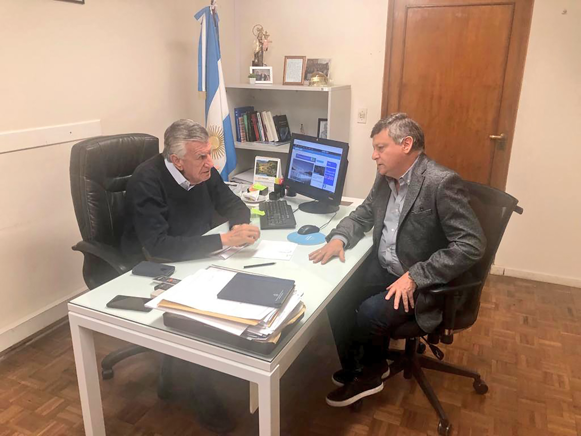 Domingo Peppo con José Luis Gioja en la sede del PJ nacional