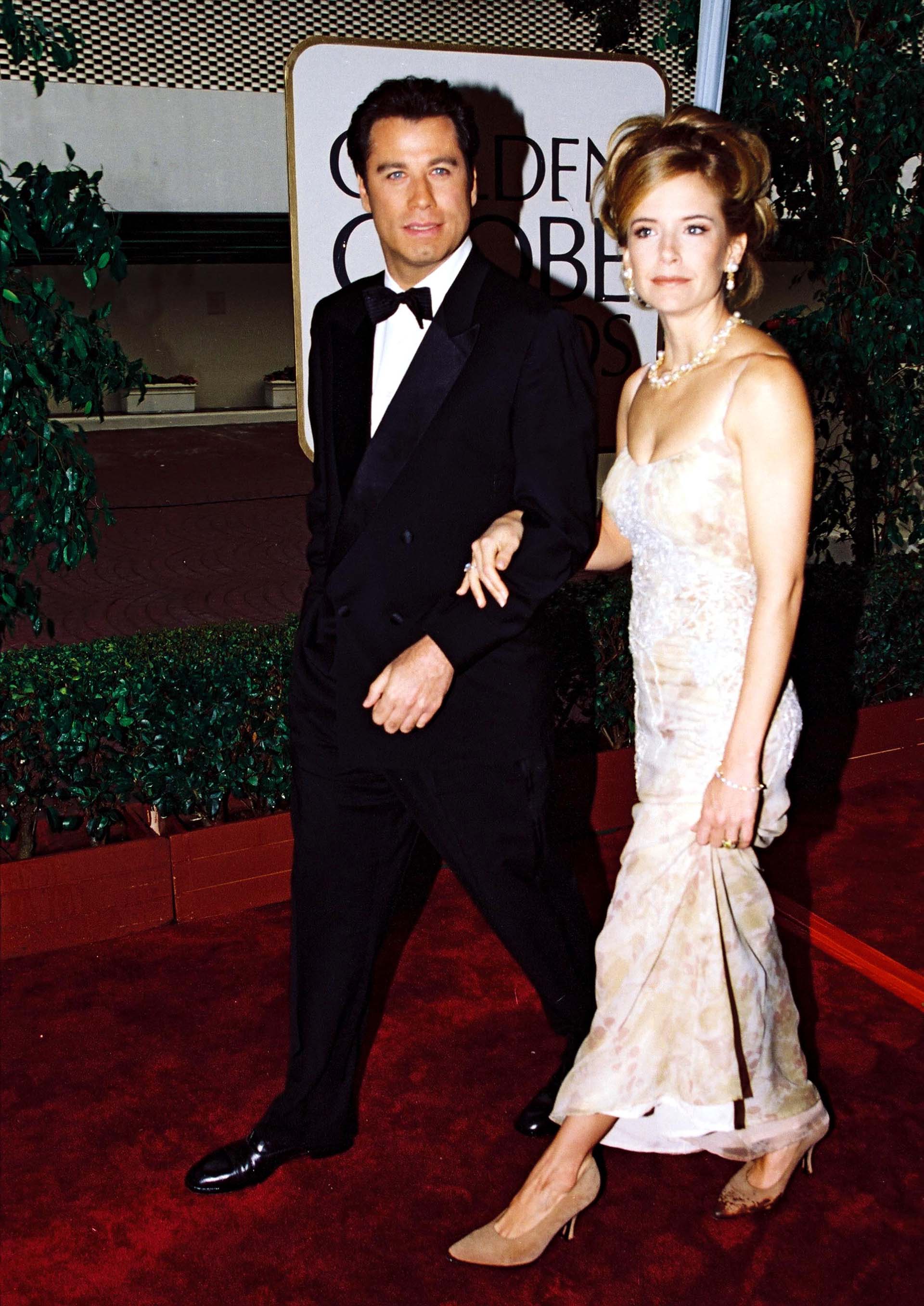 John y Kelly siguieron mostrándose juntos en la alfombra roja. “Él tiene dependencia de ella”, aseguraron sus amigos (Shutterstock)
