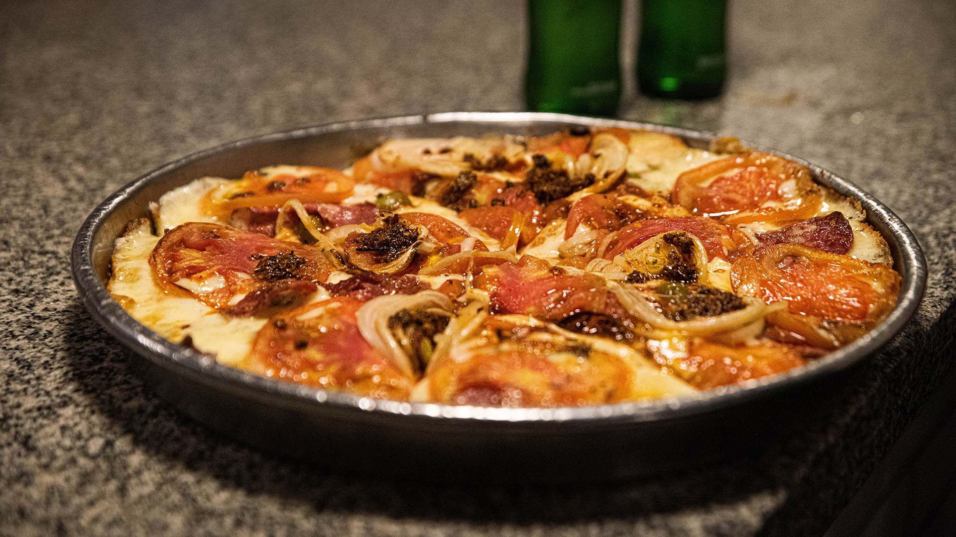 Pizza al molde, así sirven las pizzas en Banchero desde 1932