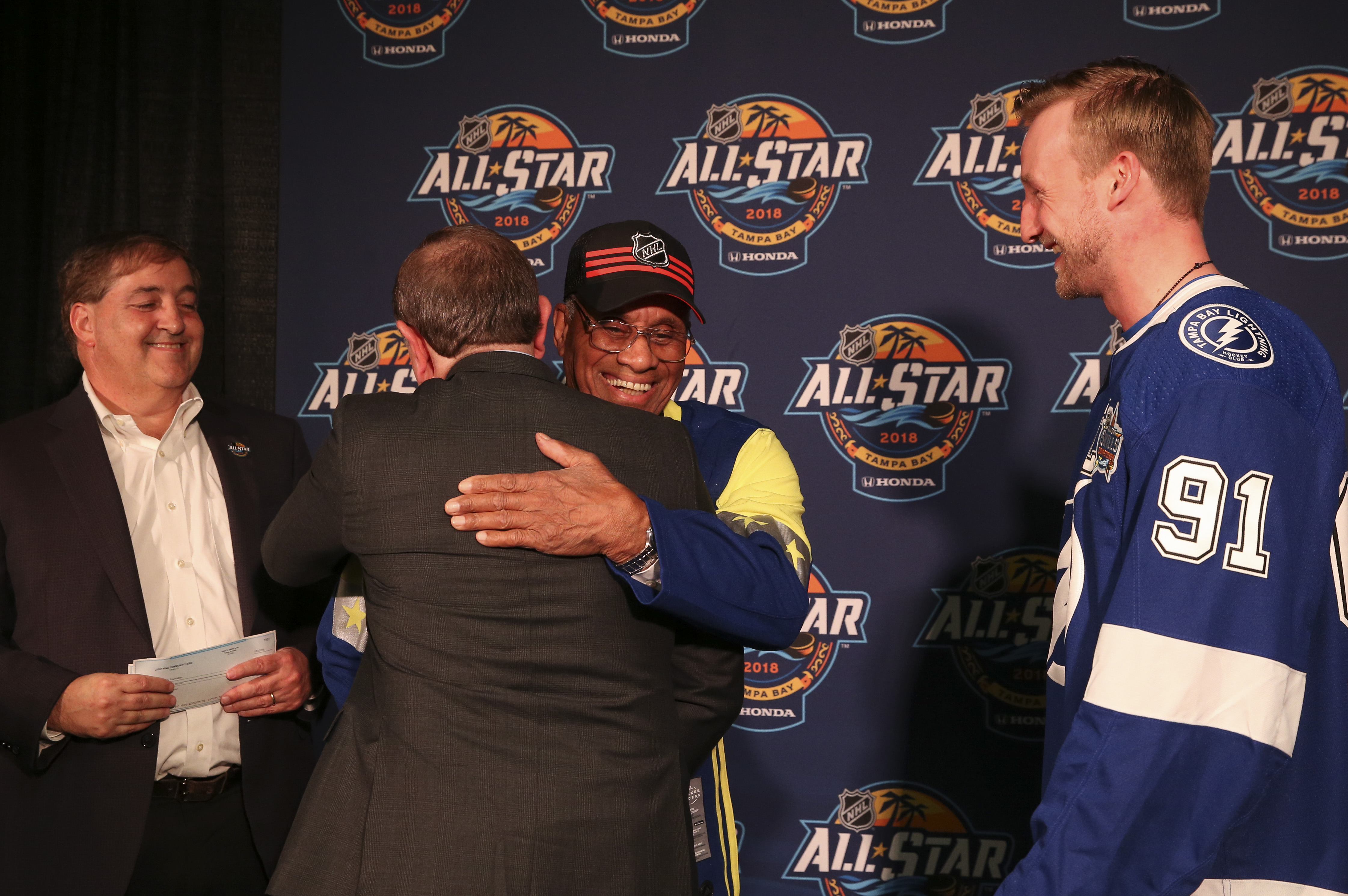 Willie O'Ree, the first black hockey player in the NHL, is honored before  the start of the second period during the NHL All-Star Game at Philips  Arena in Atlanta on January 27