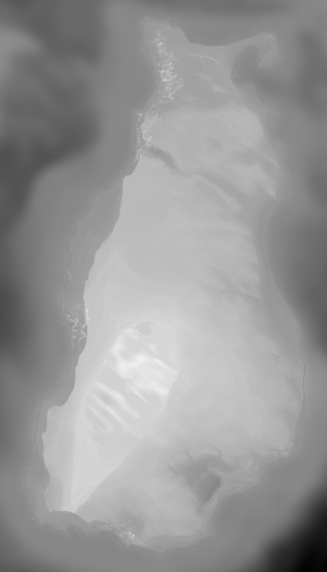 The heightfield: Big Beaver Island, Lake Michigan rendered from bare-earth LiDAR and lake bathymetry. 16-bit greyscale, linear in elevation and carrying no shading or colour: the input a CNC toolpath reads. It includes the lake floor, which is what makes it the right file for an epoxy pour — and now the floors of the four inland lakes that have been sounded, so Lake Geneserath is a basin rather than a lid.