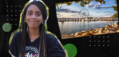 A local student smiles next to a ferris wheel from the county