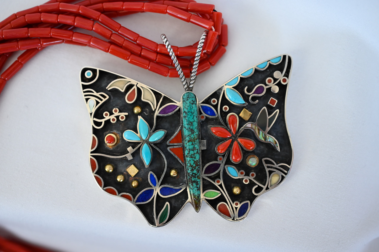 Photo Credit:Butterfly Pendant/ Sterling silver,18K accents with coral and stone inlay     ith coral and stone inlay Talia Quandelacy 