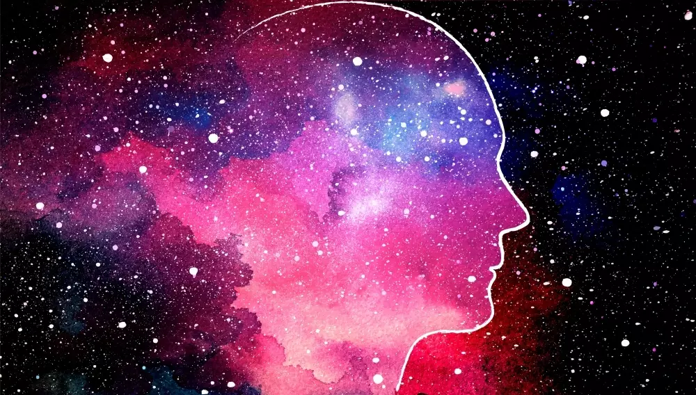 Sideview outline of person's face filled with stars