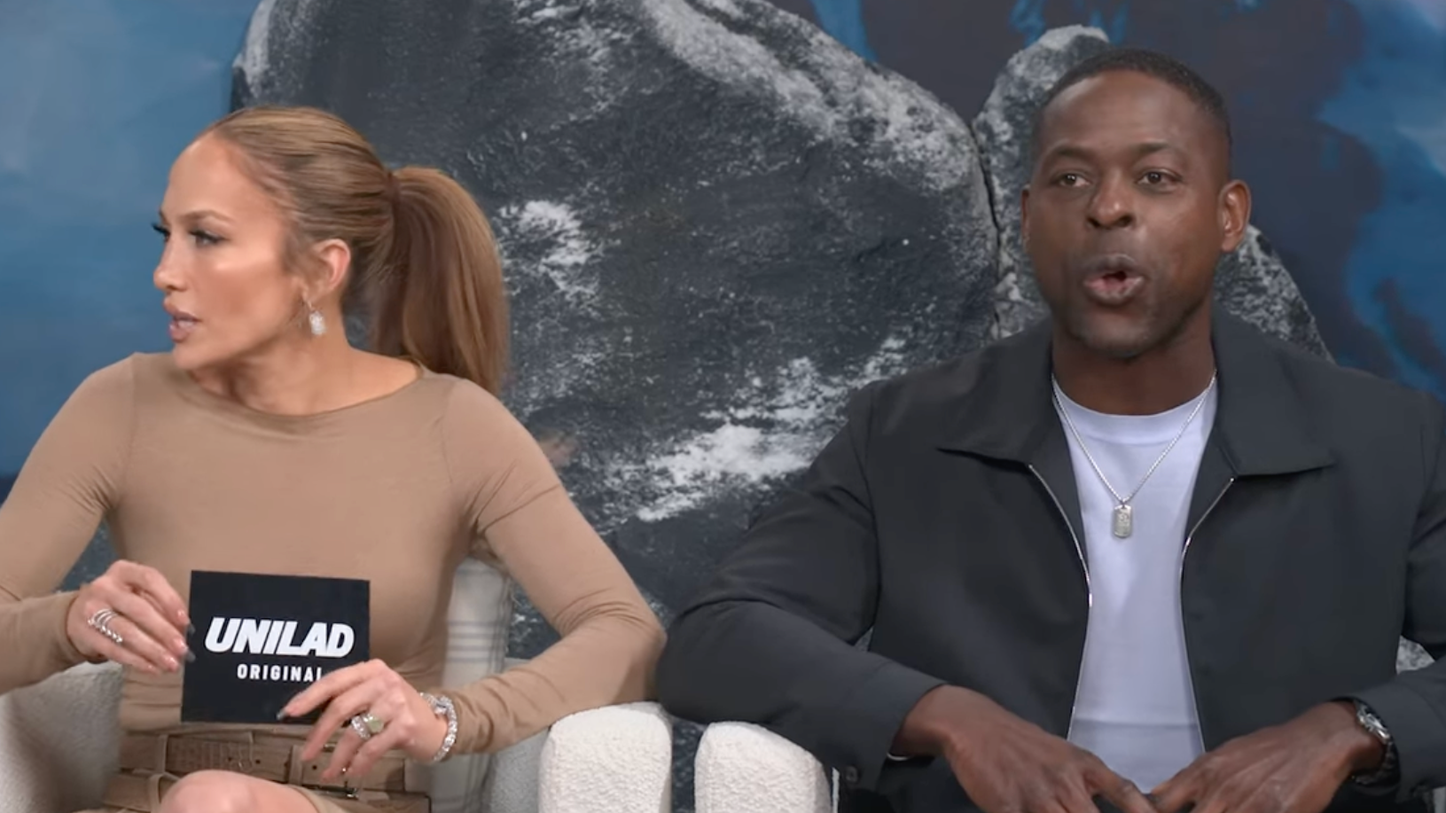 Jennifer Lopez, left; Sterling K. Brown. Screenshot: YouTube/Unilad