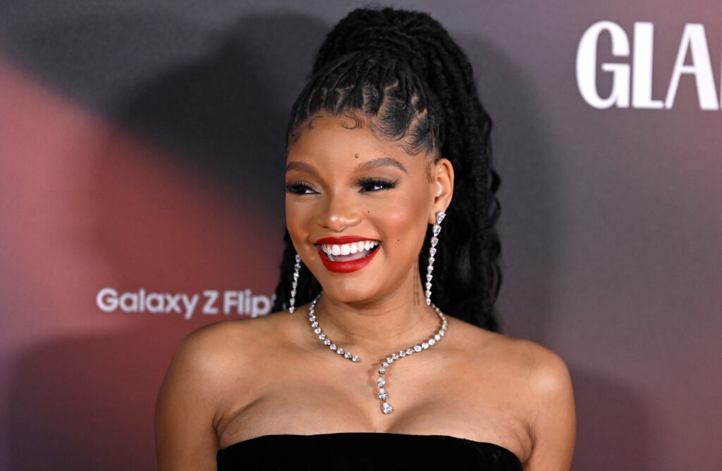 As Pregnancy Rumors Intensify, Halle Bailey Talks ‘Scrutiny’ While Being in the Spotlight