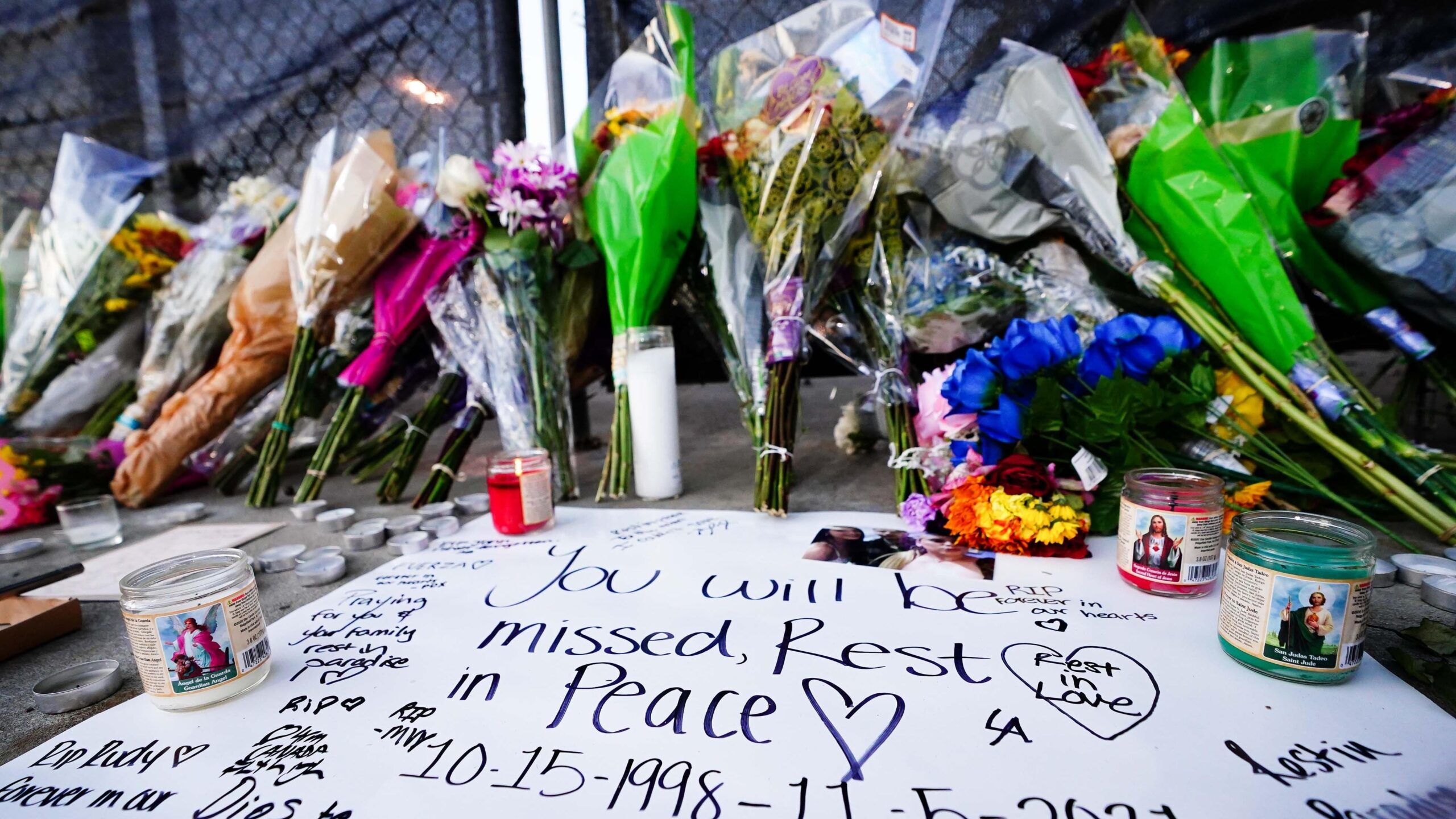 Candles, flowers and letters are placed at a memorial outside of the canceled Astroworld festival at NRG Park on November 7, 2021, in Houston, Texas. Photo: Getty Images Alex Bierens de Haan