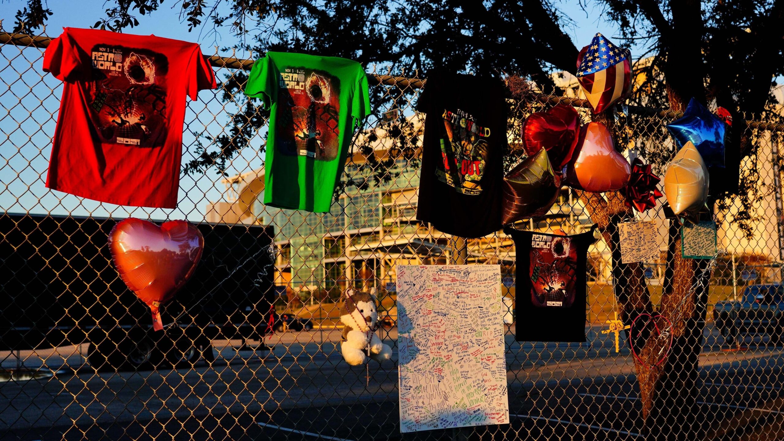 Shirts, balloons and letters are seen outside of the canceled Astroworld festival at NRG Park in Houston, Texas. According to authorities, 8 people died and 17 people were transported to local hospitals after what was described as a crowd surge at the festival, started by Houston-native rapper and musician Travis Scott in 2018. Photo: Getty Images Alex Bierens de Haan