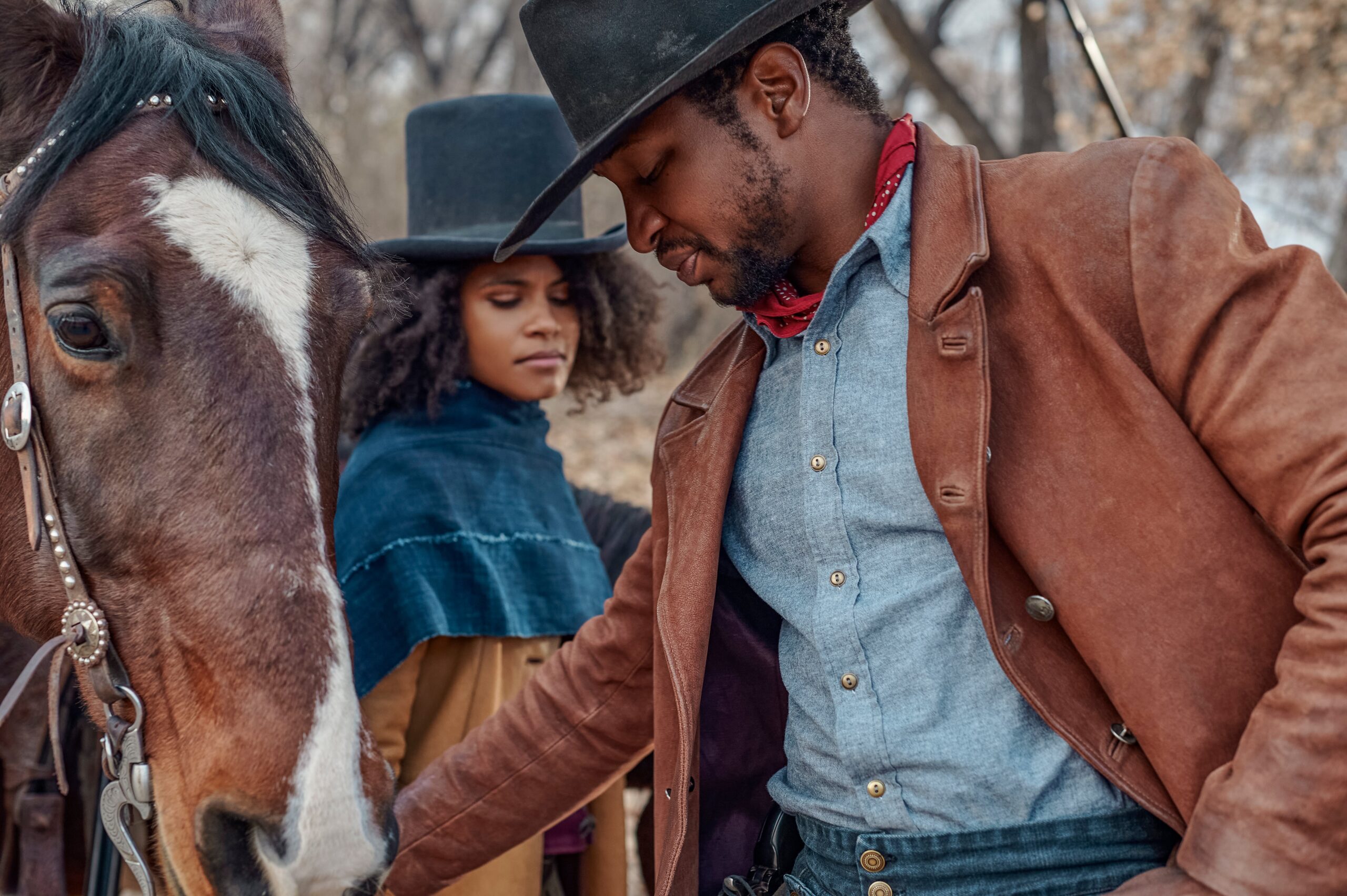 Zazie Beetz (left) and Jonathan Majors star in the decidedly Black “The Harder They Fall.” Photo: Netflix