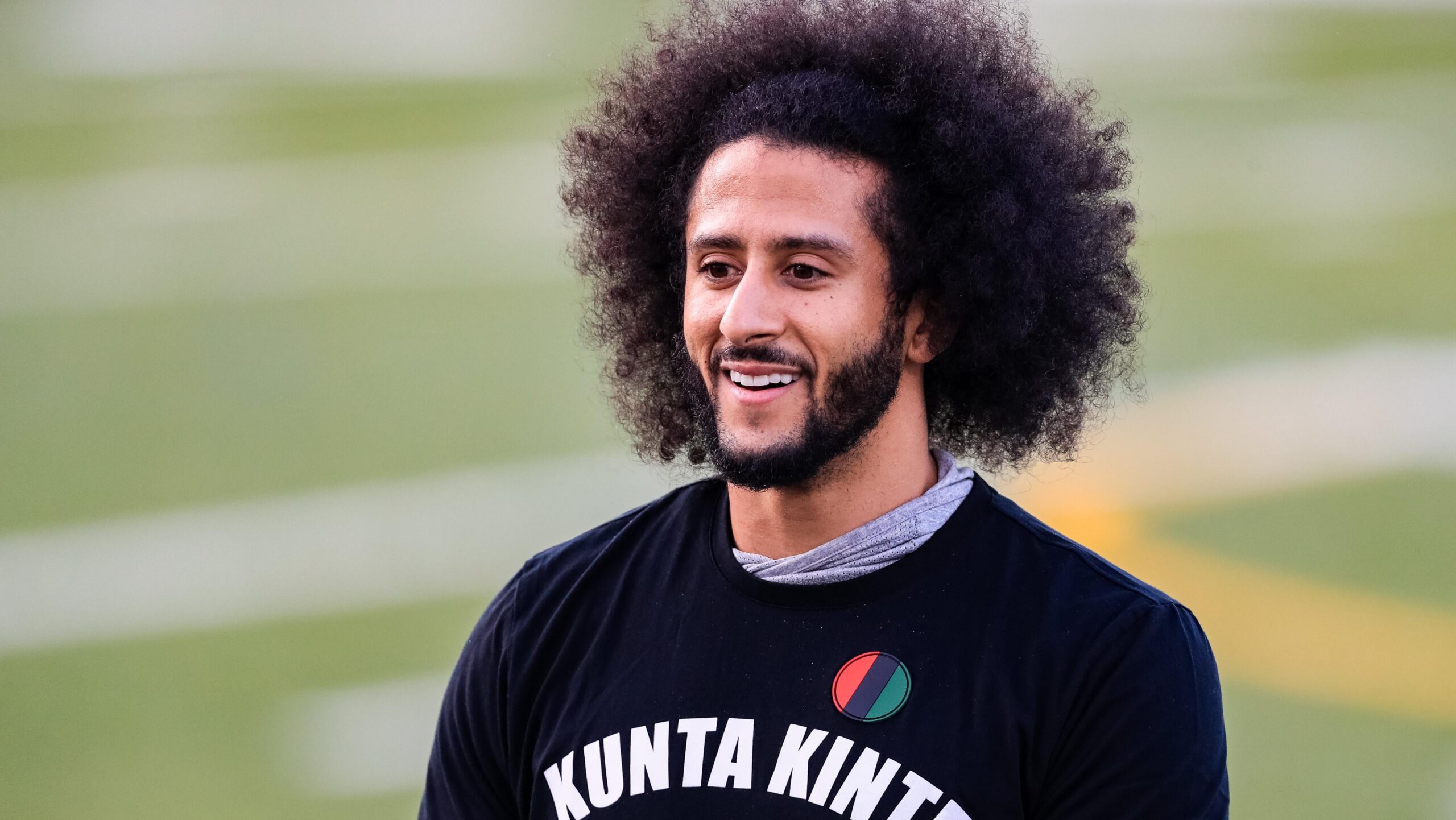 Colin Kaepernick looks on during his NFL workout held at Charles R Drew high school on November 16, 2019 in Riverdale, Georgia. Photo: Getty Images Carmen Mandato