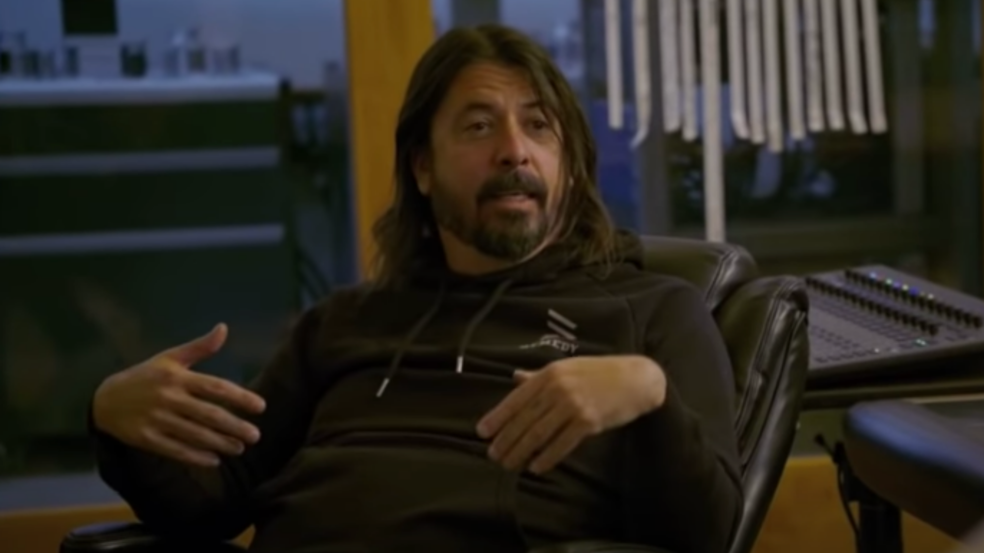 Dave Grohl sits with Pharrell Williams on Paramount+ series, From Cradle to Stage (2021). Screenshot: YouTube