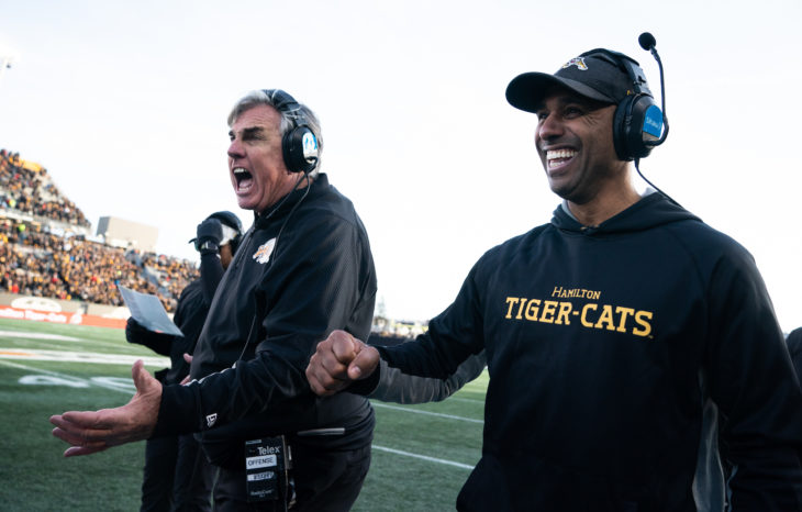 Hamilton Tiger-Cats offensive assistant Jim Barker and head coach Orlondo Steinauer after the CFL Eastern Final game between the Edmonton Eskimos and the Hamilton Tiger-Cats at Tim Hortons Field in Hamilton, ON, Sunday, Nov. 17, 2019. (Photo: Johany Jutras / CFL)