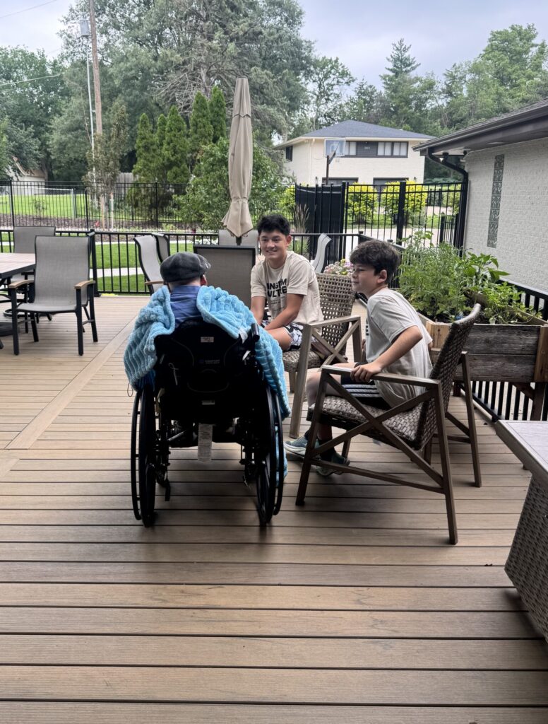 boys talking with elders