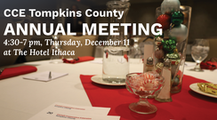 A table set with festive holiday decorations and text CCE Tompkins County Annual Meeting, 4:30-7 pm, Thursday, December 11 at the Hotel Ithaca.