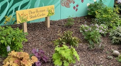 Deer-resistant plants with signage