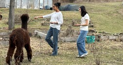 Cecilia Reyes and Mildred Alvarado on their land at CASA in Danby, NY 