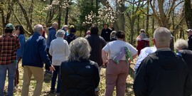 group of people on a spring tour in durand