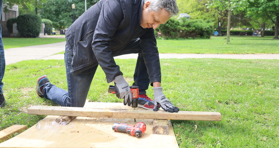 An Energy Warriors trainee practices using a power drill during training.