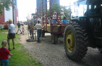 Visitors board the hayride at Farm City Day 2007, Lew-Lin Farm, Dryden NY.