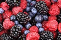a picture of blueberries, raspberries and blackberries