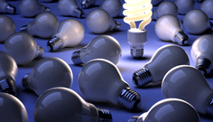 CFL lightbulb surrounded by incandescent bulbs (NOTE: this is used by CCE-Tompkins as the image for $ave Energy, Save Dollars workshops)