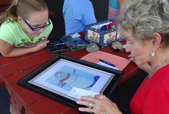 Warren County Youth Fair - Fair Judge and Youth look at exhibit. 